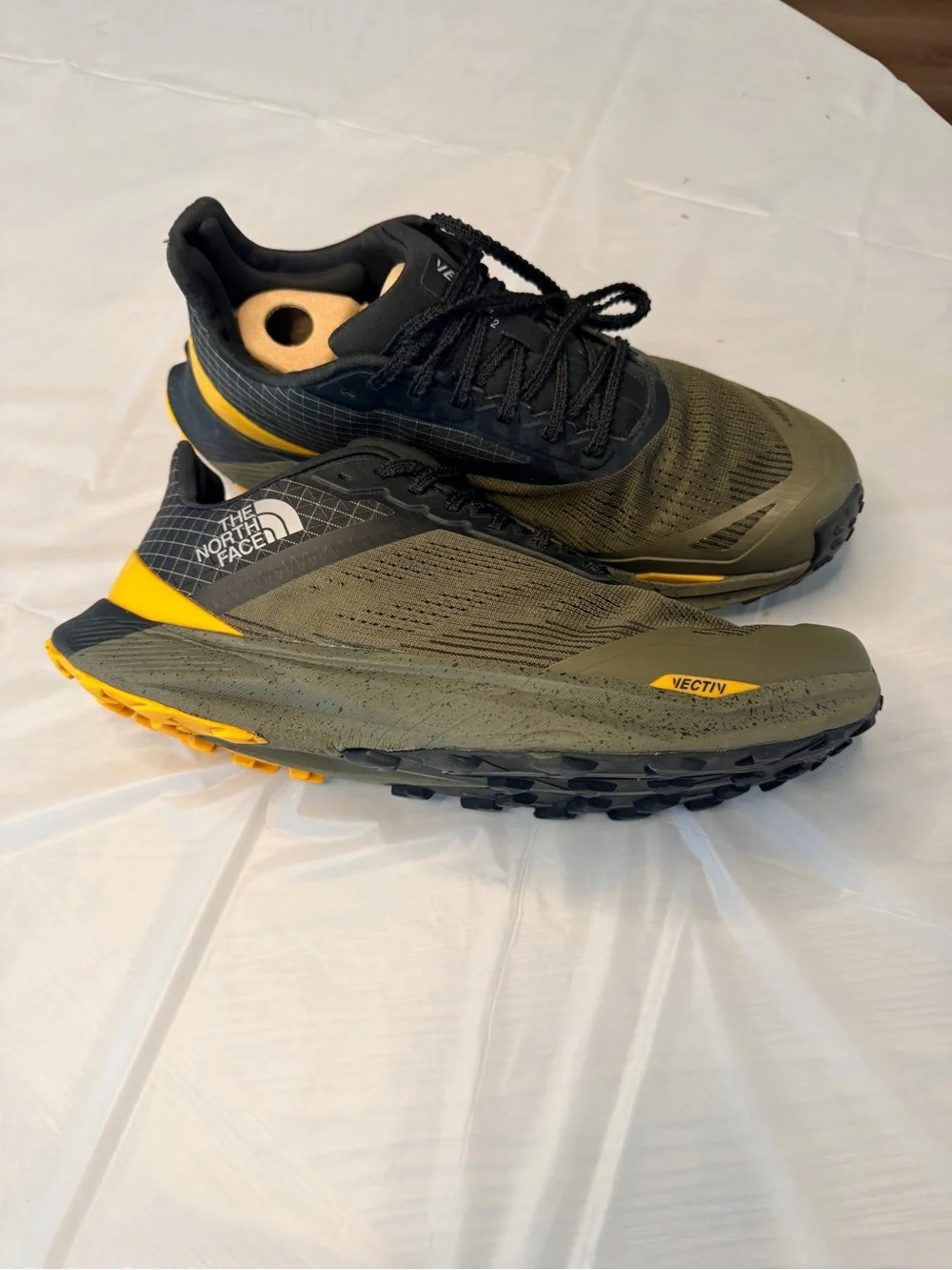 The North Face Men's Black and Olive Trail Shoes with Yellow and Red Accents
